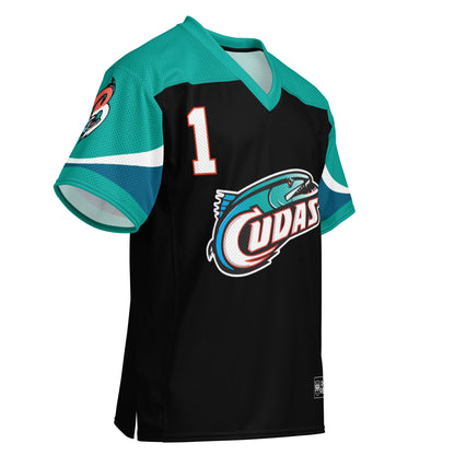 Birmingham all-over pattern short-sleeve football jersey, Black. Teal shoulders and sleeves. #1 in white with orange trim upper left. Barracuda logo, teal and blackfish, with ail forming C in white with UDAS in white following, large on chest. Royal Retros