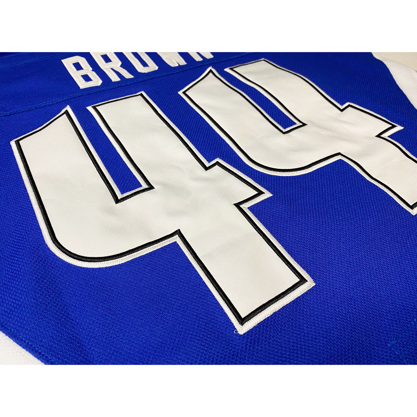 Baton Rouge Kingfish close-up blue hockey jersey. Royal Retros