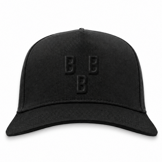 Birmingham Black Barons blackout snapback hat with tonal black 3D puff BBB embroidery, front view