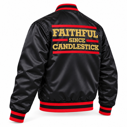 Candlestick black satin varsity jacket, three-quarter back view. Gold FAITHFUL SINCE CANDLESTICK lettering with red bars and red-black-red rib-knit trim.