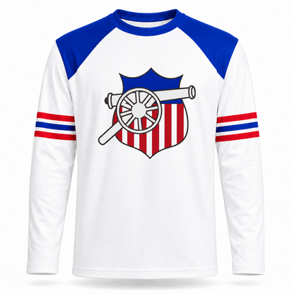 St Louis Gunners football jersey front, white body with blue shoulders, red white and blue striped sleeve bands, and a cannon-and-shield emblem on the chest