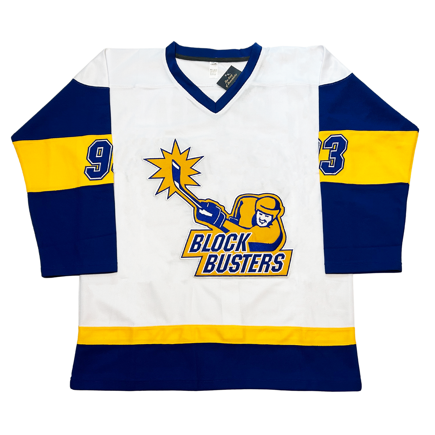 Florida Block Busters hockey jersey. White with blue collar. Blue sleeves with thick yellow band mid-sleeve. #93 blue with white trim in band. Yellow and Blue band above waist. Logo in center of player, chest-up, in gold with blue detail making a slap shot. Burst around end of stick blade. BLOCK BUSTERS in blue with white trim below. Royal Retros