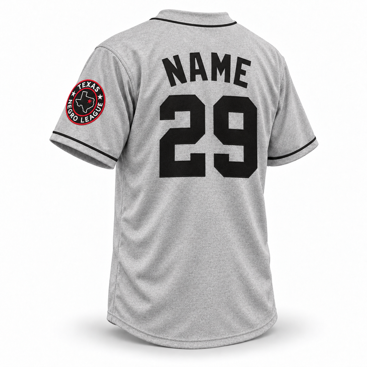 Fort Worth Black Panthers NLB jersey, gray back with black block NAME and number 29, Texas Negro League patch on left sleeve, black collar and cuff piping.