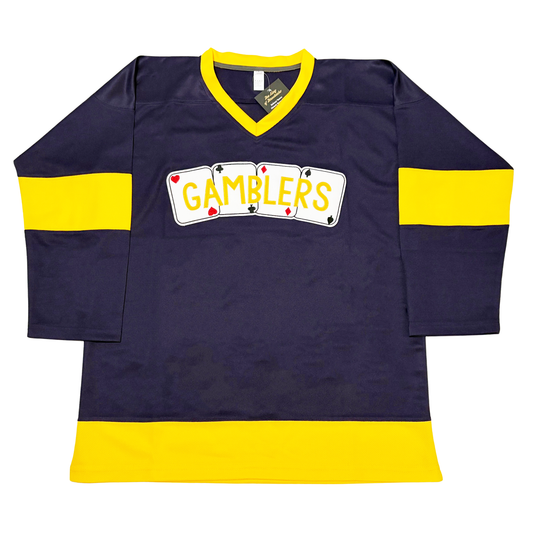 Las Vegas Gamblers Jersey - Purple with yellow trim on neck and waist. Yellow bands around mid-sleeves. Gamblers in gold across 4 playing cards (hearts, clubs, diamonds, spades, outlined in black and white. Royal Retros.