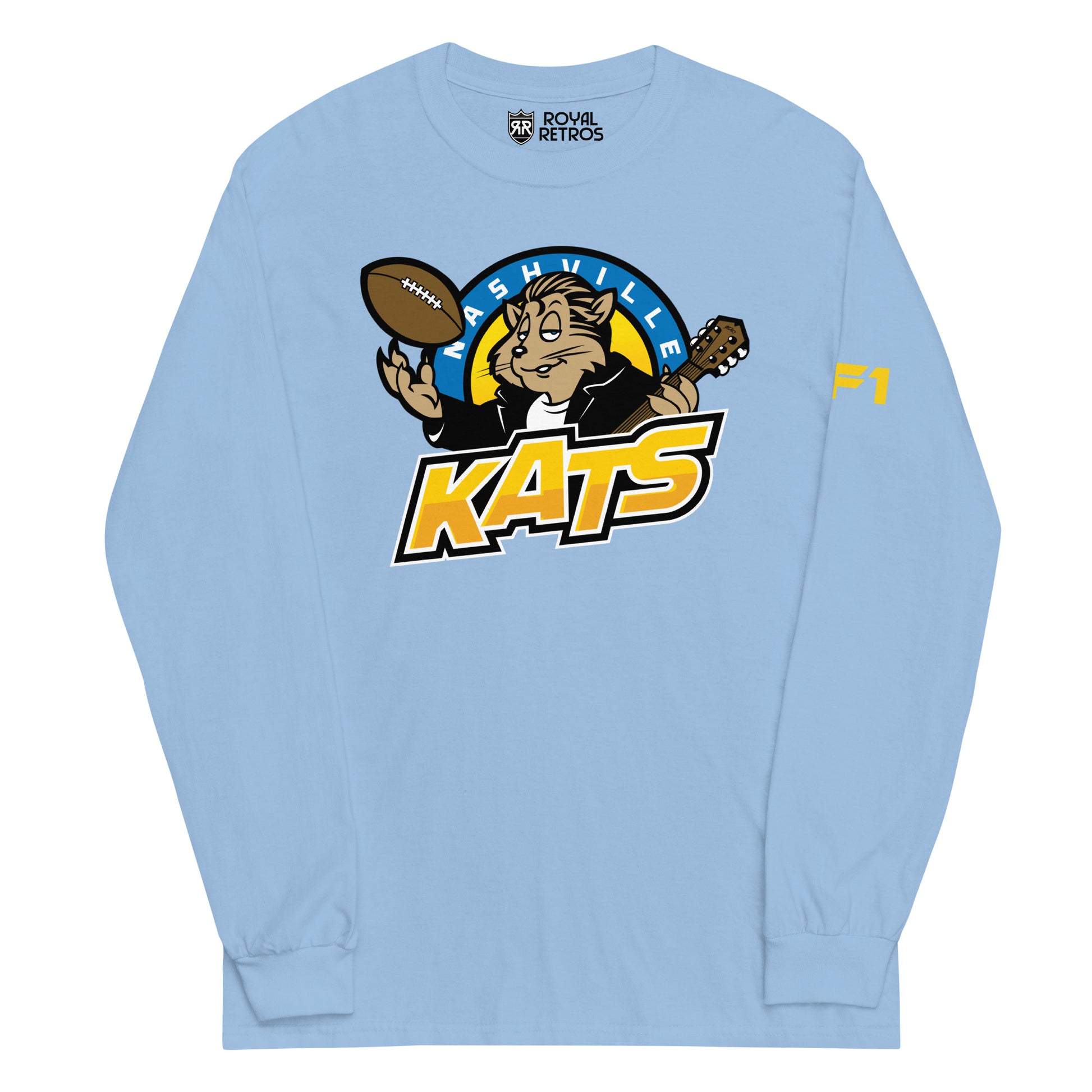Nashville Kats long sleeve T-shirt. Light Blue. Nashville in white in blue half circle. Cartoon Kat in leather jacket tossing up football in right hand, guitar neck in other over KATS in yellow with shadow trim. Royal Retros