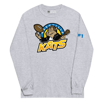 Nashville Kats long sleeve T-shirt. Heather Grey. Nashville in white in blue half circle. Cartoon Kat in leather jacket tossing up football in right hand, guitar neck in other over KATS in yellow with shadow trim. Royal Retros