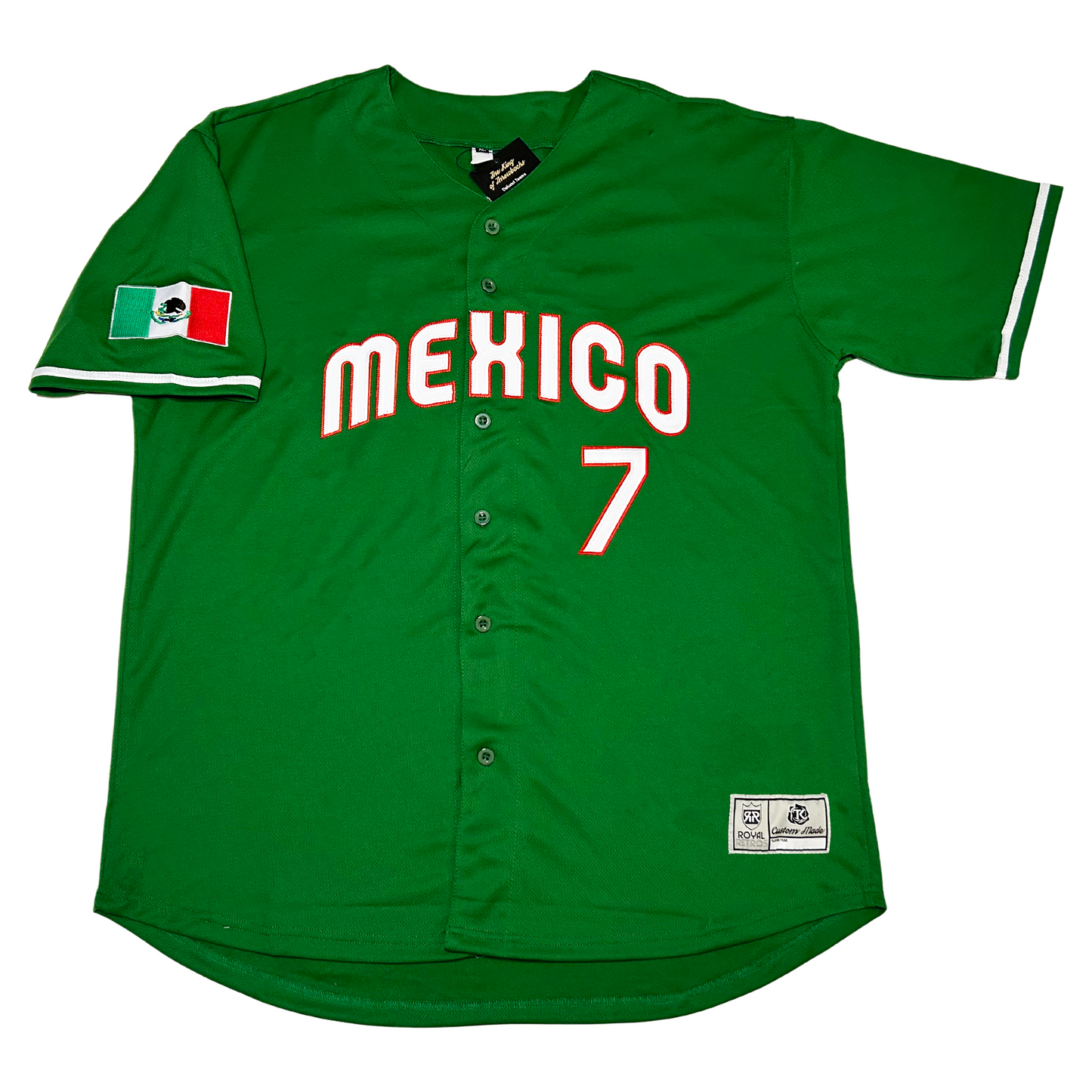 Mexico Baseball button-up jersey green.  Mexico in white lettering with red trim arched across chest. #7 in white with red trim below right.  Mexican flag on right sleeve. White ring just above sleeve ends. Royal Retros