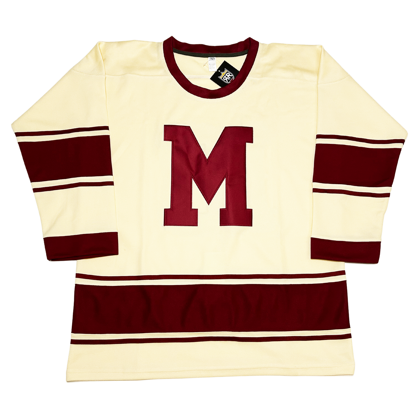 Montreal Maroons Cream Collection Jersey. Thin marron stripe followed by white, thick maroon, thin white, thon maroon band mid sleeve and around waist. Large maroon M on chest. Maroon trim on neck. Royal Retros