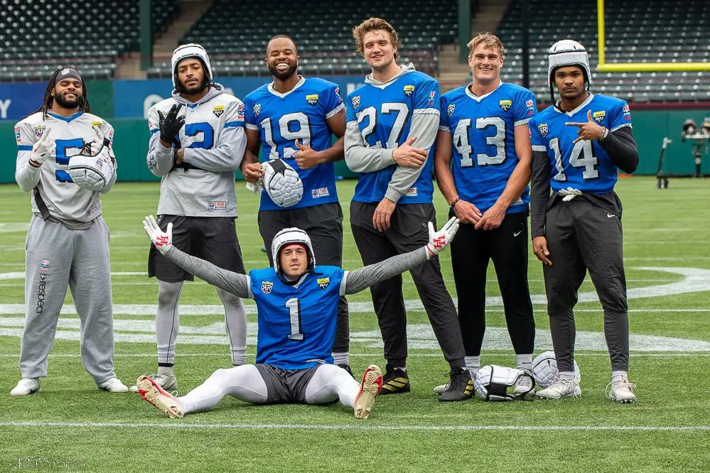 NFL Alumni Academy athletes wearing Royal Retros Performance football uniforms