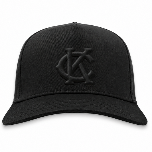 Kansas City Monarchs blackout snapback hat with black 3D puff KC embroidery, front view
