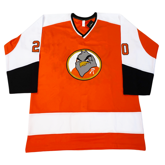 Richmond Robins Jersey orange front. Sleeves white on top, black on bottom, with orange elbows. White shoulders. White band around waist. Logo in center is a black and gold circle with a white background. Gray robin's head with gold beak, wearing an orange jersey with a white R on upper left chest.  Royal Retros