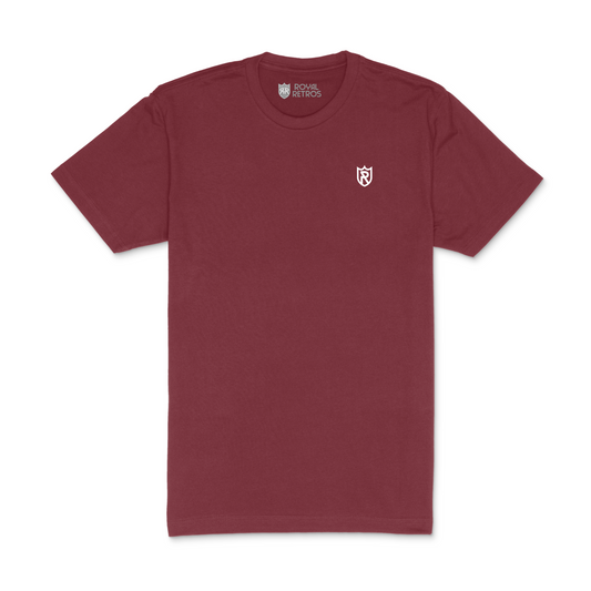 Royal Retros athletic T-shirt. Cardinal red. Royal Retros logo on left chest. Logo is a white outlined shield with an R in the middle. Royal Retros
