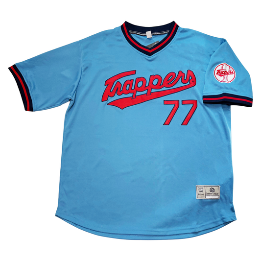 Salt Lake Trappers Jersey. Blue. Navy red and navy trim on neck and short sleeves. Trappers in red across chest at an angle with text tail. #77 below right. Trappers baseball logo on left sleeve. Royal Retros