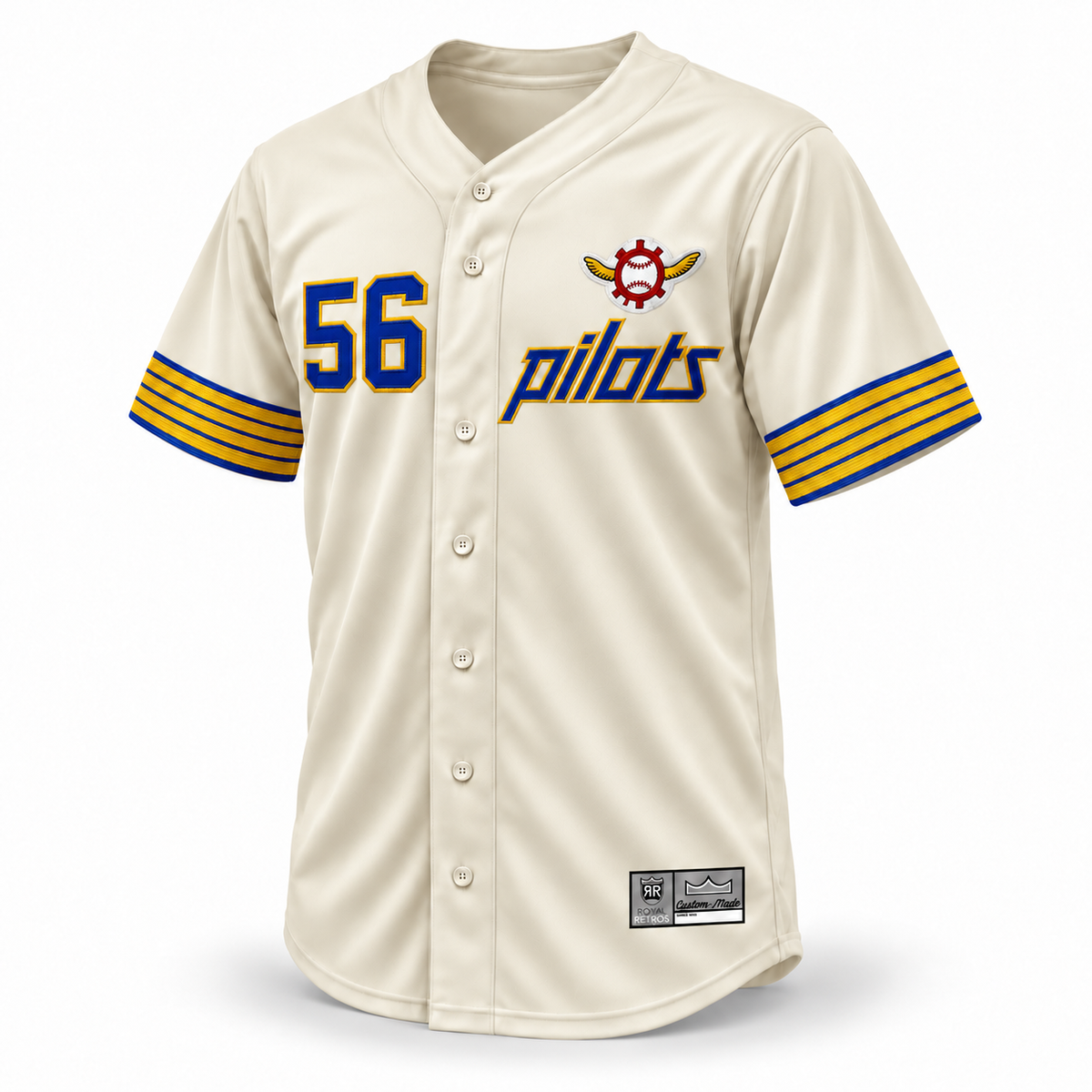 Seattle Pilots cream custom baseball jersey front with blue number 56 and Pilots lettering outlined in gold, winged baseball emblem, striped cuffs and gray Custom Made tag.