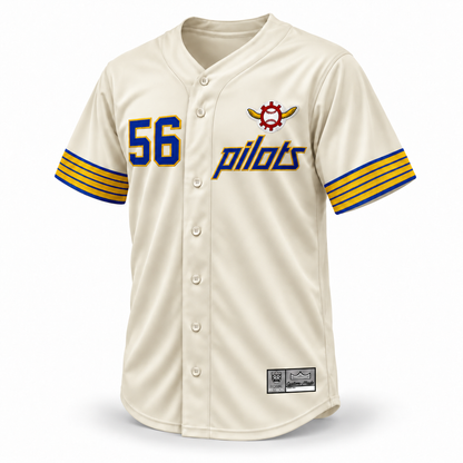 Seattle Pilots cream custom baseball jersey front with blue number 56 and Pilots lettering outlined in gold, winged baseball emblem, striped cuffs and gray Custom Made tag.
