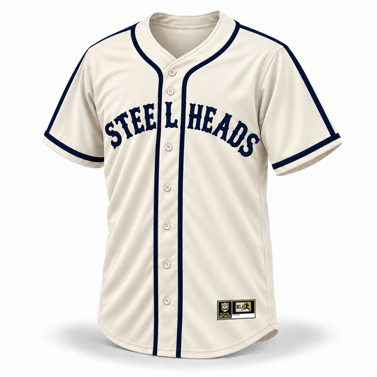 Steelheads NLB Jersey – cream front mockup with navy vintage STEELHEADS lettering, connected shoulder and sleeve stripes, navy cuff bands and original NLB jock tag