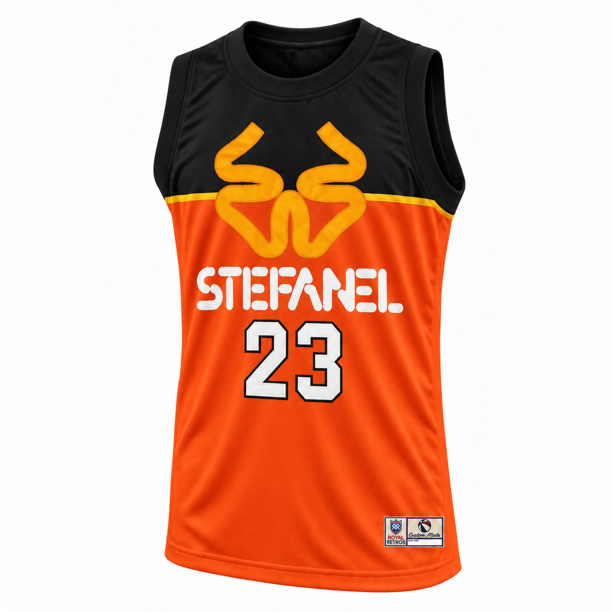 Stefanel Trieste jersey front, black upper panel and orange body, yellow emblem, white STEFANEL and number 23 with black outline. Royal Retros.