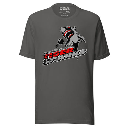 Tallahassee Tiger Sharks hockey T-shirt. Dark Gray. Logo is a shark swimming toward viewer with Tallahassee small in black with white trim above Tiger  in red and Sharks in silver. Royal Retros
