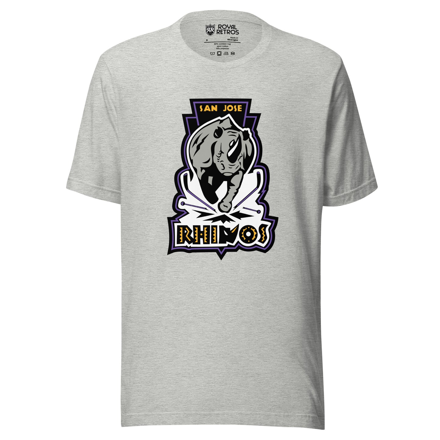 San Jose Rhinos Roller hockey T-Shirt. Light Gray. Charging Rhino. San Jose in gold above. To hockey sticks crossed below legs. Rhinos in caps underneath. Royal Retros