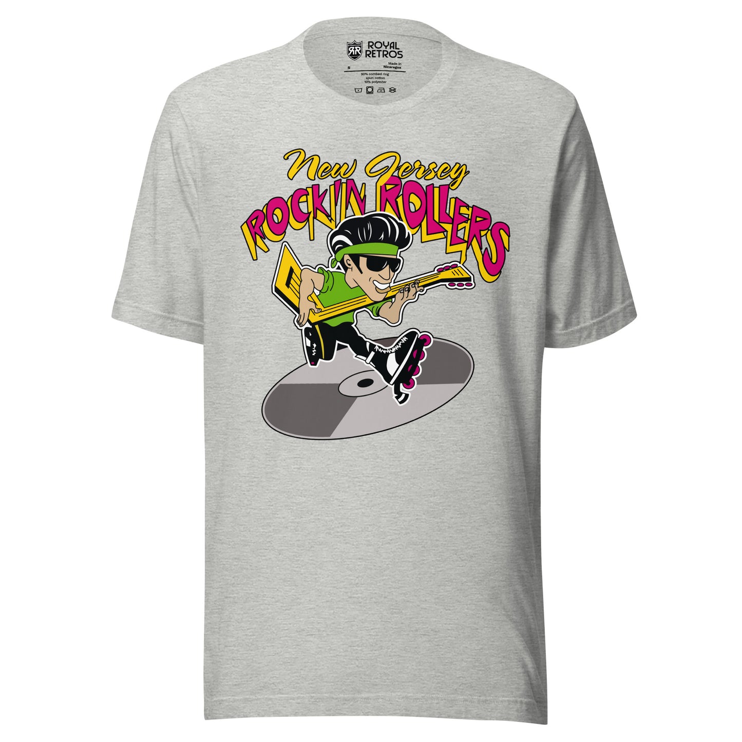 New Jersey Rockin Rollers roller hockey T-shirt light gray. New Jersey in cursive, small gold, Rockin Rollers in bold, red, with gold trim large above rock & roll star with hockey stick as guitar, green T-shirt, headband, and sunglasses, rollerblading on a silver record below. Royal Retros