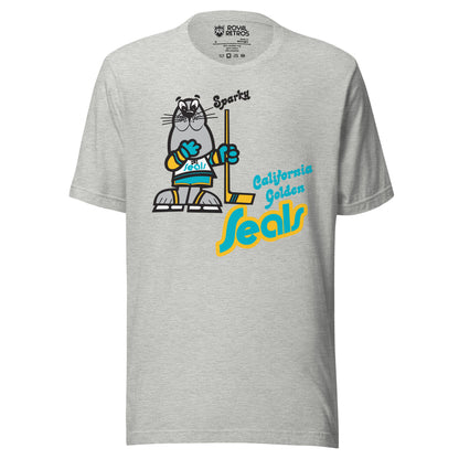 California Golden Seals Sparky T-shirt. Gray. Gray seal on skates with gold and teal gloves holding a yellow stick. California Golden in teal small to the right of hockey stick blade. Seals below in teal with gold trim lowercase in diablo typeface. Royal Retros