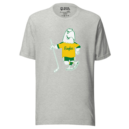 Salt Lake Golden Eagles Hockey T-shirt. Gray. Cartoon white Eagle drawn in green wearing a gold jersey with Eagles in script across chest. Green sleeve ends on Eagle's jersey. Green shorts with yellow stripes. Wearing white skates and holding a hockey stick in his right wing. Royal Retros.