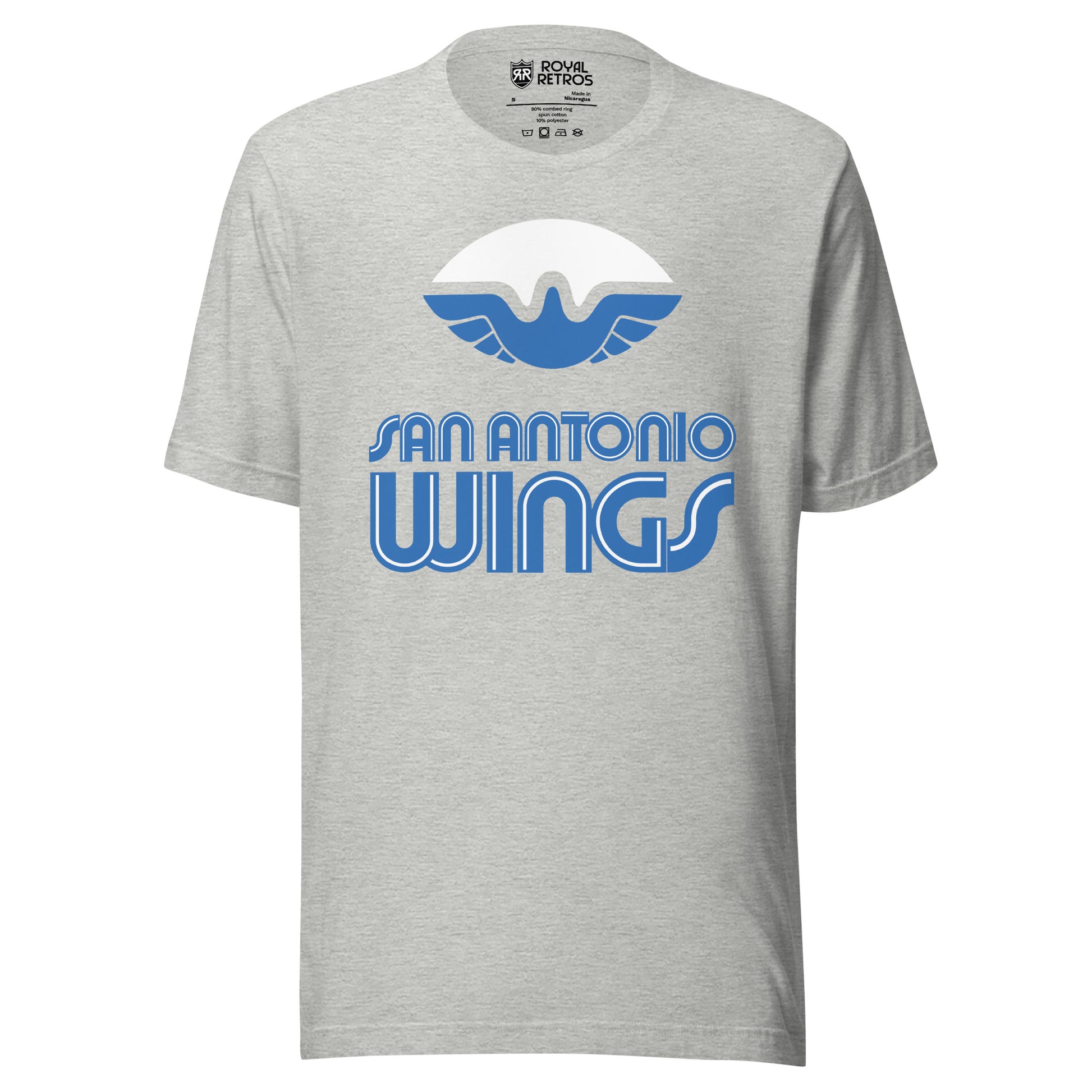 San Antonio Wings World Football League WFL T-shirt. Gray. White football with stylized bird with wings in blue filling in the bottom of the ball. San Antonio in blue with white trim above larger WINGS. Royal Retros