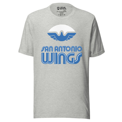 San Antonio Wings World Football League WFL T-shirt. Gray. White football with stylized bird with wings in blue filling in the bottom of the ball. San Antonio in blue with white trim above larger WINGS. Royal Retros