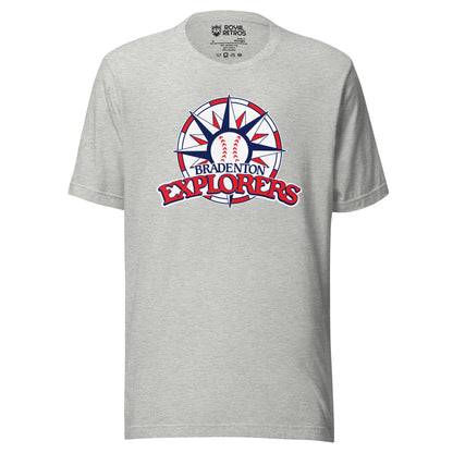 Bradenton Explorers baseball T-shirt. Gray. Circle with alternating red and white blocks. Compass star inside with alternating red and blue pattern, baseball in center. BRADENTON small in blue above EXLORERS in red across bottom of circle. Royal Retros