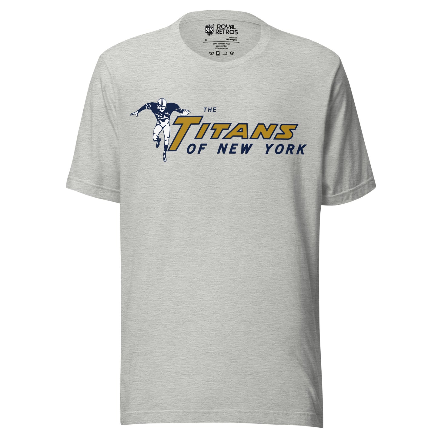 New York Titans T-shirt. American Football League. Gray. Football player to the left, arms outstretched , running toward viewer. TITANS to right in gold, with large T. Of New York below in blue. Royal Retros.