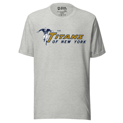 New York Titans T-shirt. American Football League. Gray. Football player to the left, arms outstretched , running toward viewer. TITANS to right in gold, with large T. Of New York below in blue. Royal Retros.