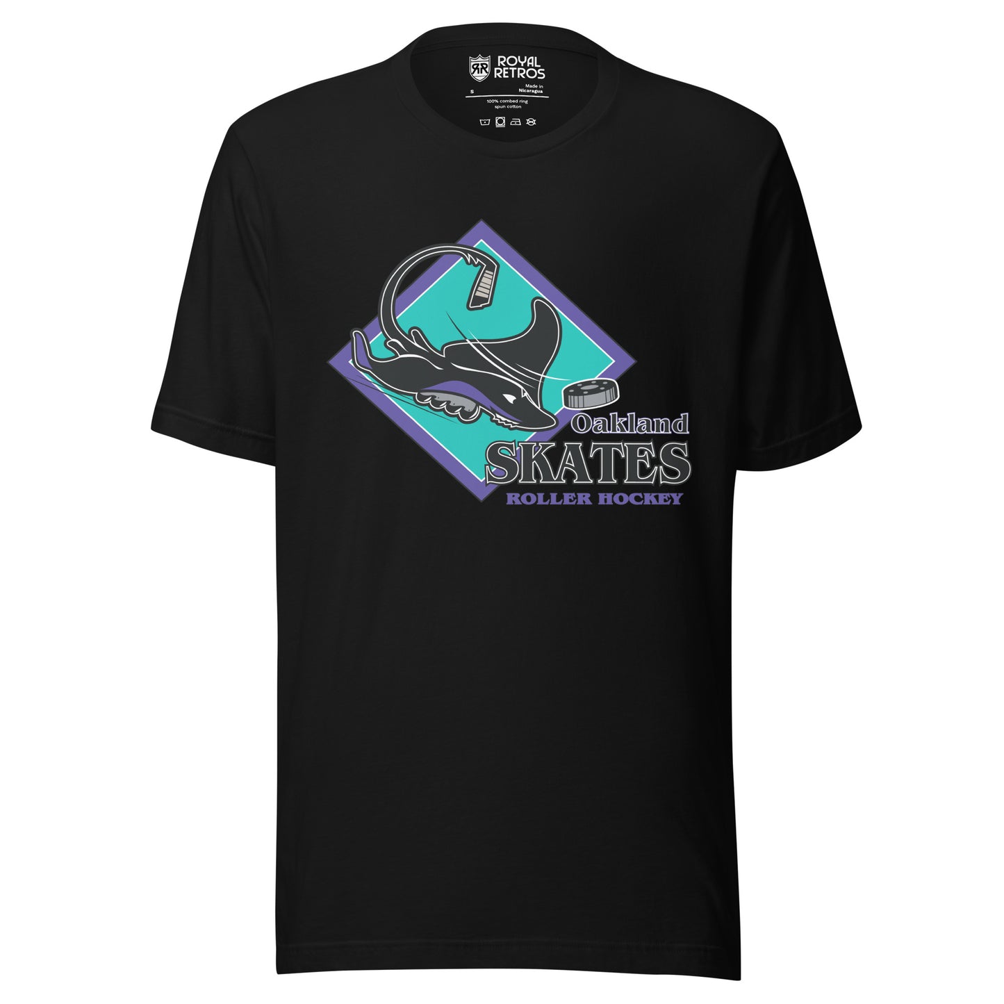 Oakland Skates roller hockey T-Shirt. Black. Aqua diamond with purple trim. Manta Ray swimming tom the right over diamond. To the right, Oakland small over Skates large, purple with white lining, Roller Hockey smaller in purple. Royal Retros
