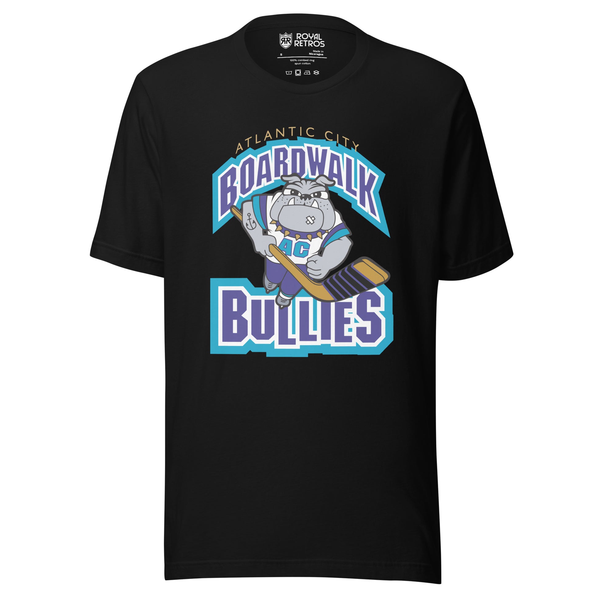 Atlantic City Boardwalk Bullies hockey T-shirt. Black. Boardwalk arched in purple with white and teal trim. Cartoon bulldog skating toward viewer holding hockey stick. Bullies in purple with white and teal trim. Royal Retros