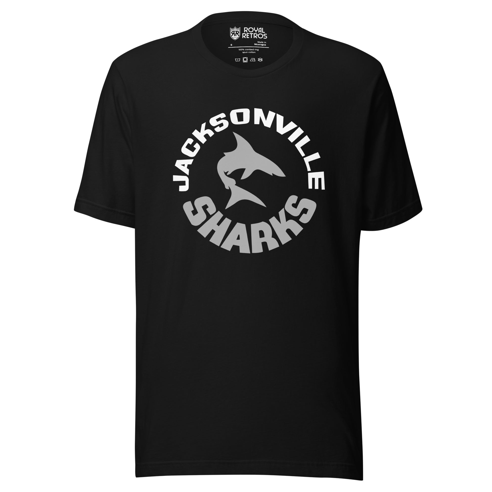 Jacksonville Sharks World Football League WFL T-shirt. Black. JACKSONVILLE in white arched above, SHARKS in silver arched up below. Silhouette of shark in silver swimming in center. Royal Retros 