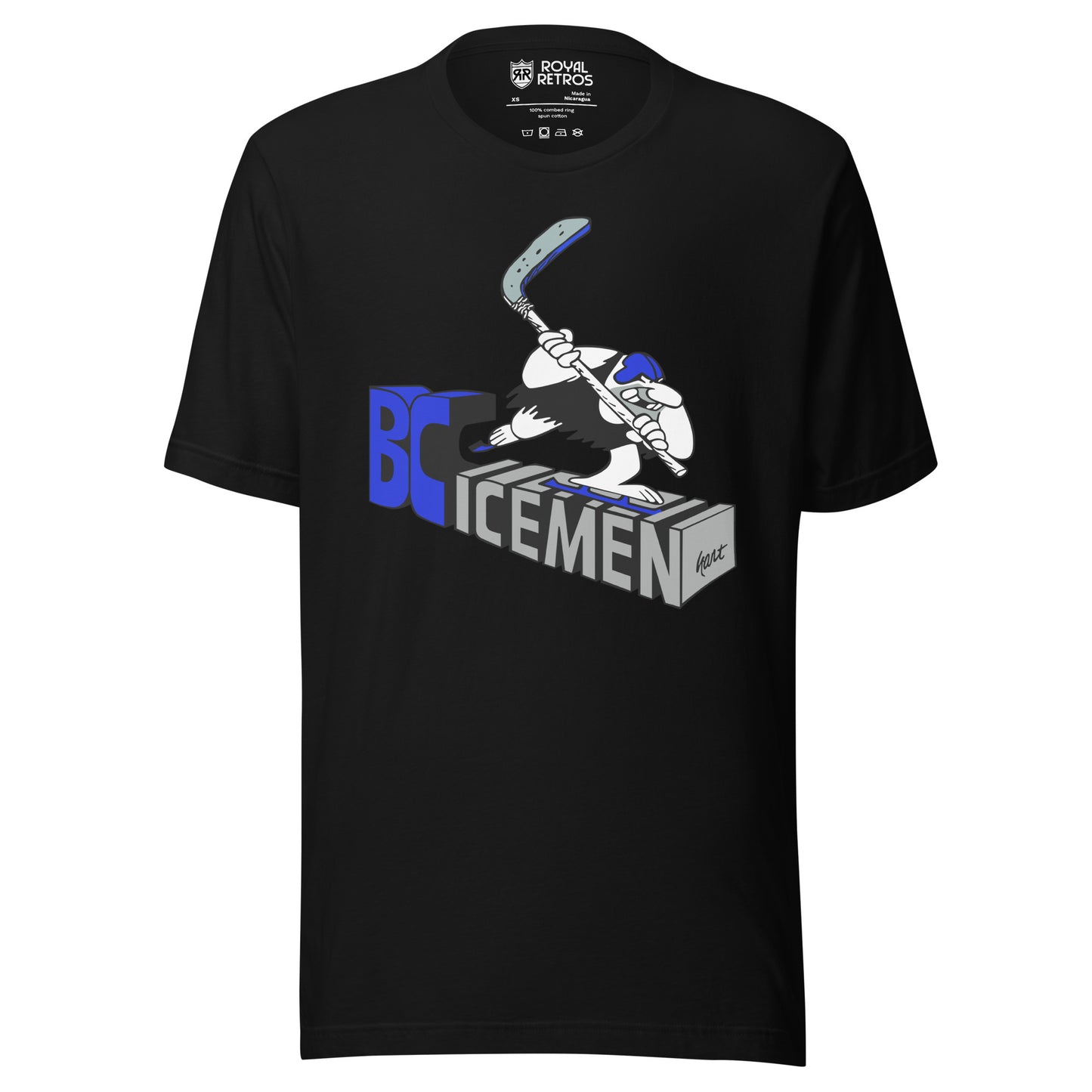 Black BC Icemen t-shirt with a cartoon hockey player mid-slapshot skating over 3D block letters reading BC Icemen in blue and gray
