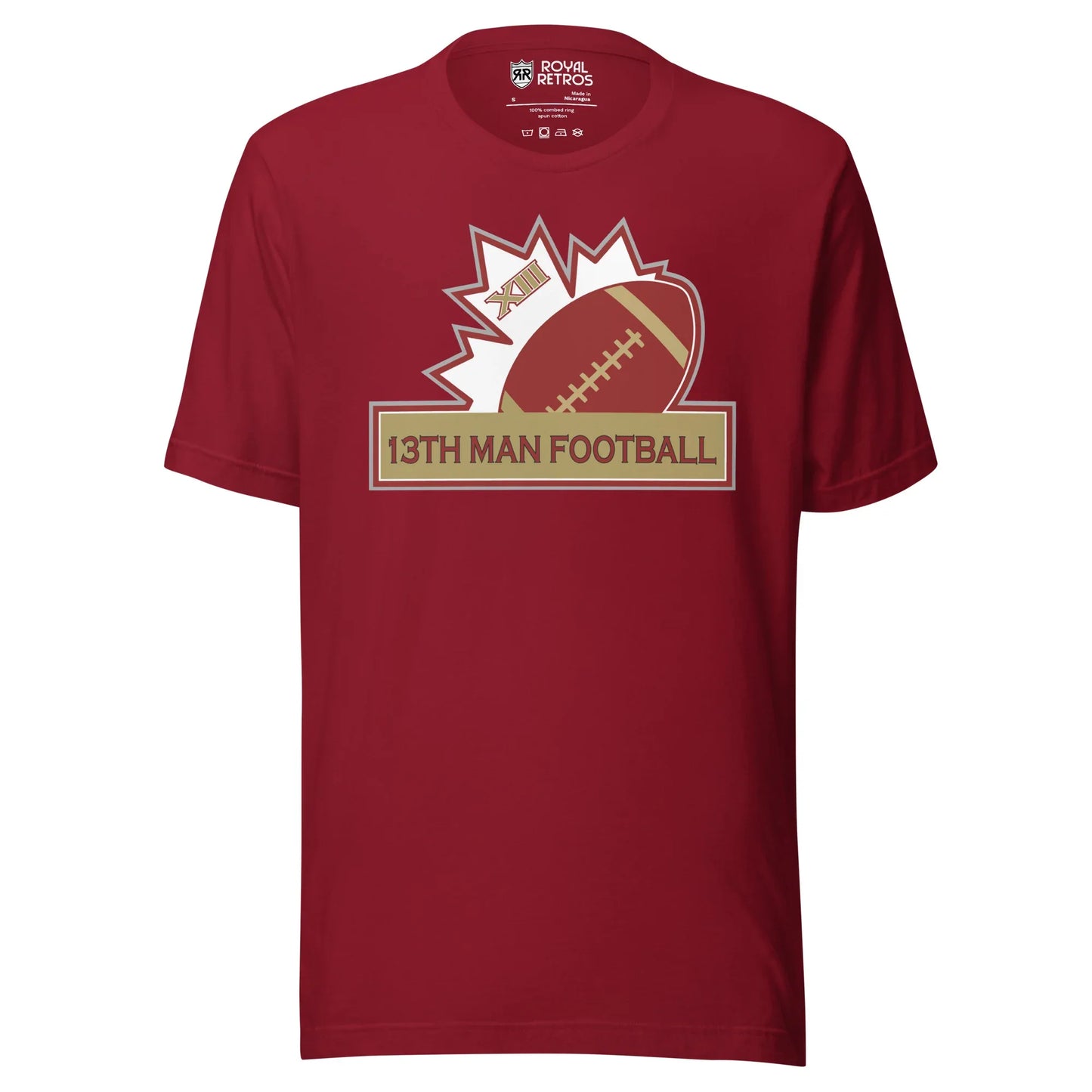13th Man football T-shirt. Maroon. Top of white maple leaf tilted left. Football leaning right. Gold box below with red trim with 13th Man Football in red inside. Royal Retros