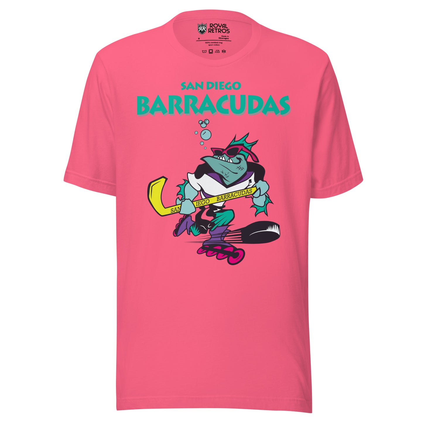San Diego Barracudas roller hockey T-shirt. Pink. San Diego in aqua small over Barracudas in aqua large below. Below text, cartoon barracuda inline skating with hockey stick. Bubbles coming out of its mouth. Royal Retros.
