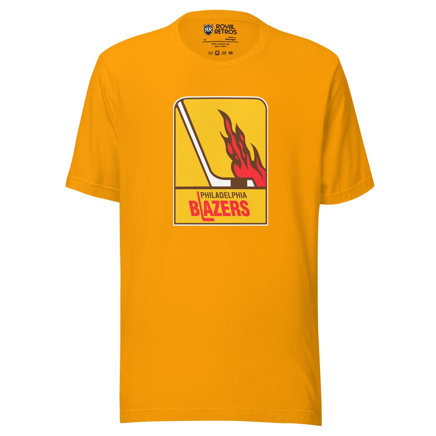 Philadelphia Blazers WHA T-shirt. Gold. Logo is vertical gold rectangle. Hockey stick in white facing right. Flames above the blade. Philadelphia in black small above Blazers larger in red. L is a hockey stick Royal Retros