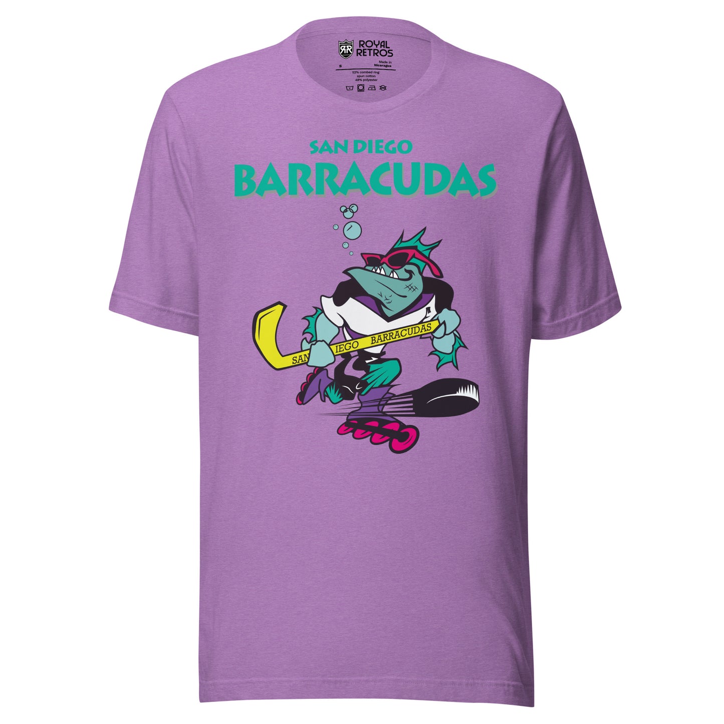San Diego Barracudas roller hockey T-shirt. Purple. San Diego in aqua small over Barracudas in aqua large below. Below text, cartoon barracuda inline skating with hockey stick. Bubbles coming out of its mouth. Royal Retros.