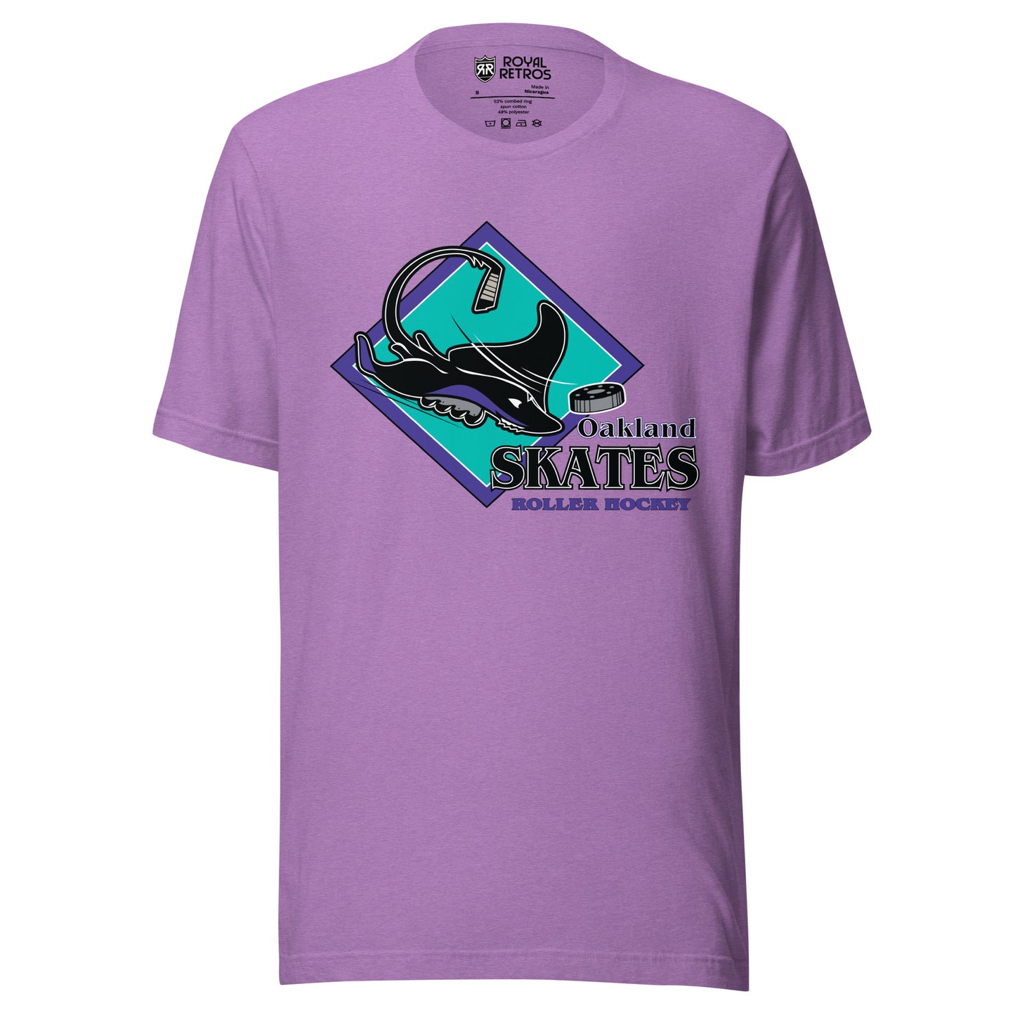 Oakland Skates roller hockey T-Shirt. Heather Purple. Aqua diamond with purple trim. Manta Ray swimming tom the right over diamond. To the right, Oakland small over Skates large, purple with white lining, Roller Hockey smaller in purple. Royal Retros