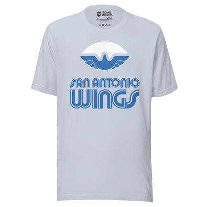 San Antonio Wings World Football League WFL T-shirt. Light Blue. White football with stylized bird with wings in blue filling in the bottom of the ball. San Antonio in blue with white trim above larger WINGS. Royal Retros