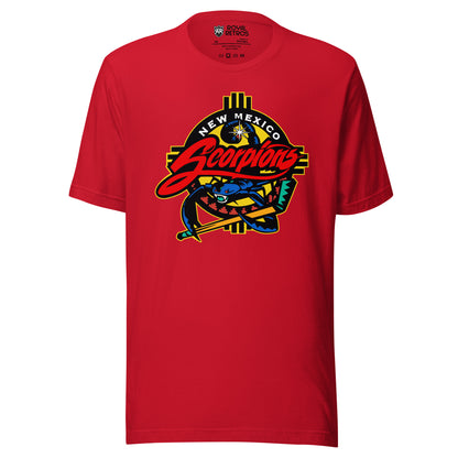 New Mexico Scorpions hockey T-shirt in red. Southwestern Zia-sun emblem in yellow and black behind a blue scorpion gripping a hockey stick, with 'New Mexico Scorpions' wordmark in white and red script.