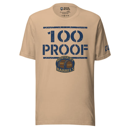 Kentucky Barrels 100 Proof T-shirt. Blue line across top. Tan. 100 with PROOF below. Blue line below. Logo small below over middle of blue line. Logo on chest is a rounded square with Kentucky in gold arched over a barrel, with Barrels underneath. Shape is outlined in gold. Royal Retros