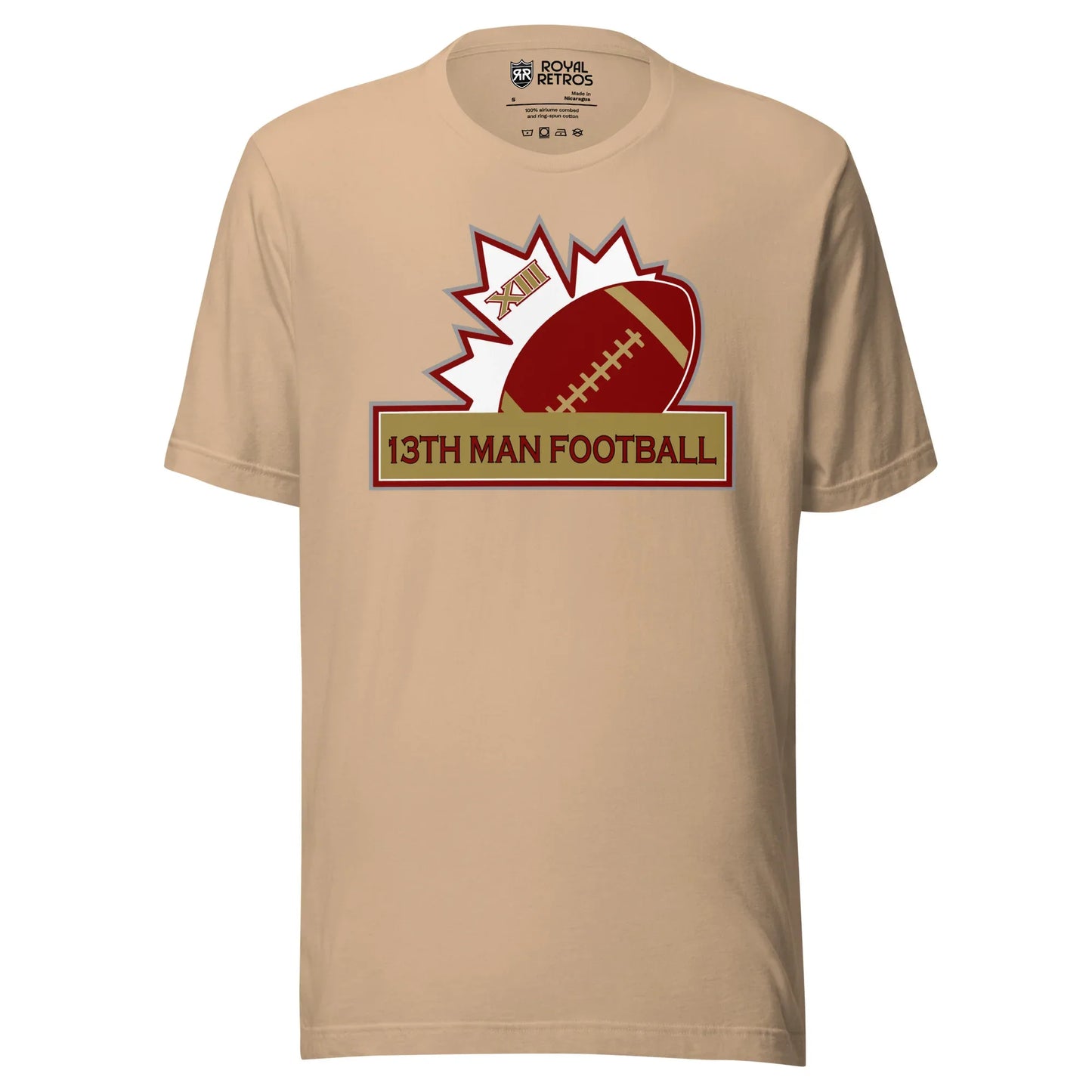 13th Man football T-shirt. Tan. Top of white maple leaf tilted left. Football leaning right. Gold box below with red trim with 13th Man Football in red inside. Royal Retros