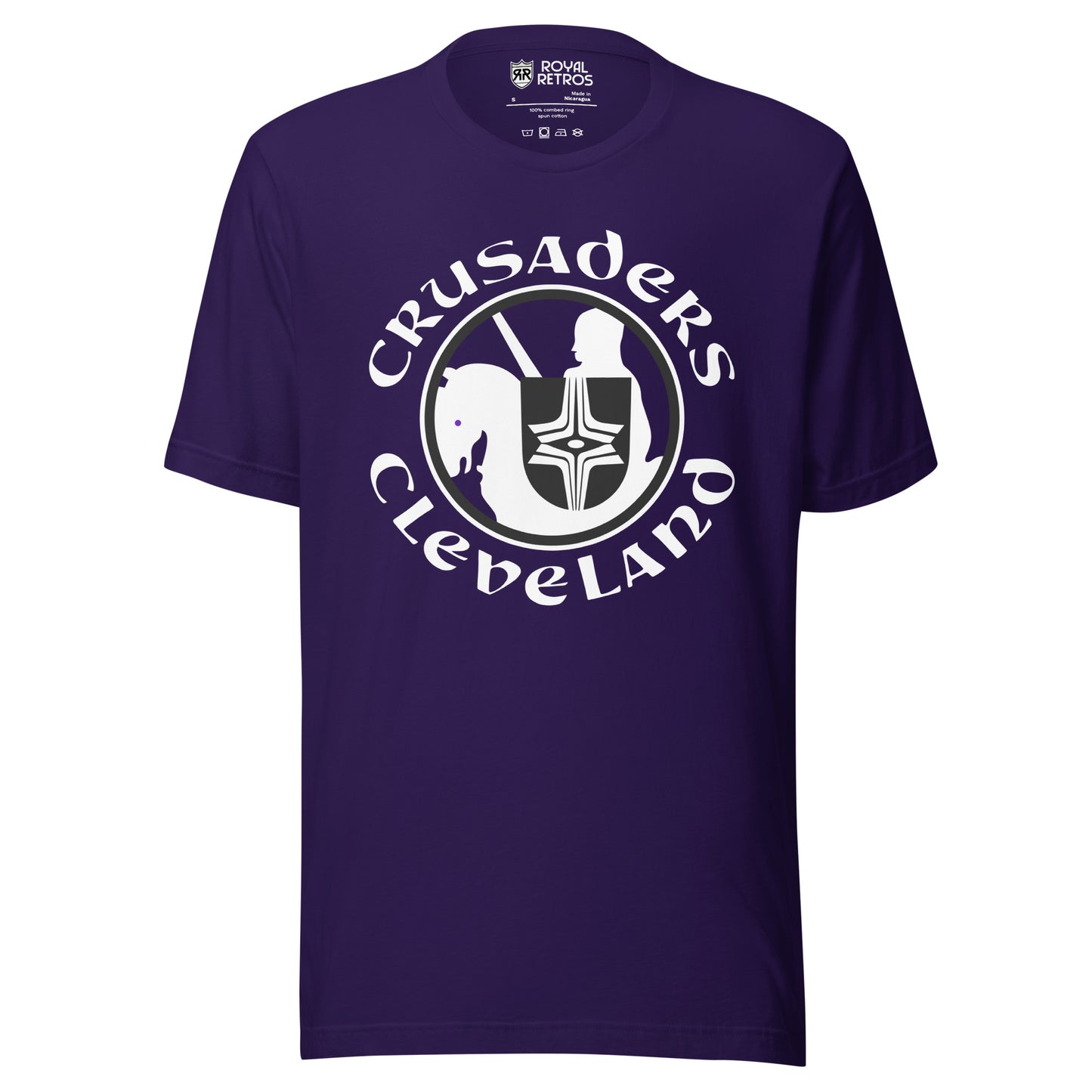 Cleveland Crusaders WHA T-shirt. Purple. Logo on chest: White circle with stylized knight on horse with black shield with white cross design. Horse is facing left. Crusaders in white curved over top of circle, Cleveland in white arched below. Royal Retros
