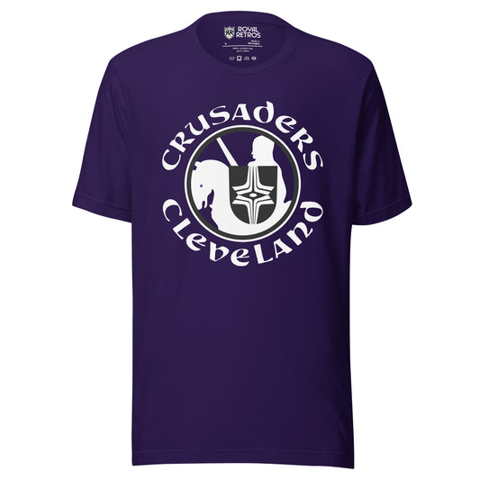 Cleveland Crusaders WHA T-shirt. Purple. Logo on chest: White circle with stylized knight on horse with black shield with white cross design. Horse is facing left. Crusaders in white curved over top of circle, Cleveland in white arched below. Royal Retros