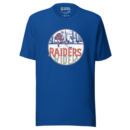 New York Raiders WHA T-shirt. Royal. Logo on chest. White circle, with hockey player skating in front of Manhattan Skyline in blue. Raiders in orange below skater, reflected in gray below. Royal Retros