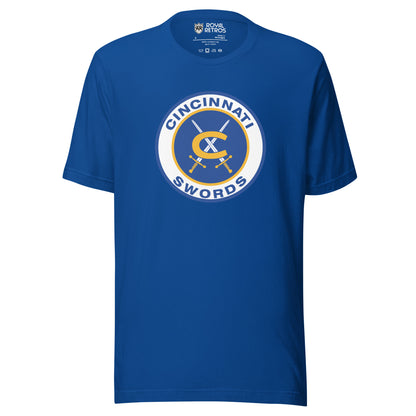 Cincinnati Swords AHL hockey T-shirt. Blue. Thick white circle with blue background. Cincinnati in blue arched in top of circle Swords arched up in circle below. Gold C in center with two swords with gold handles crossed behind it. Royal Retros