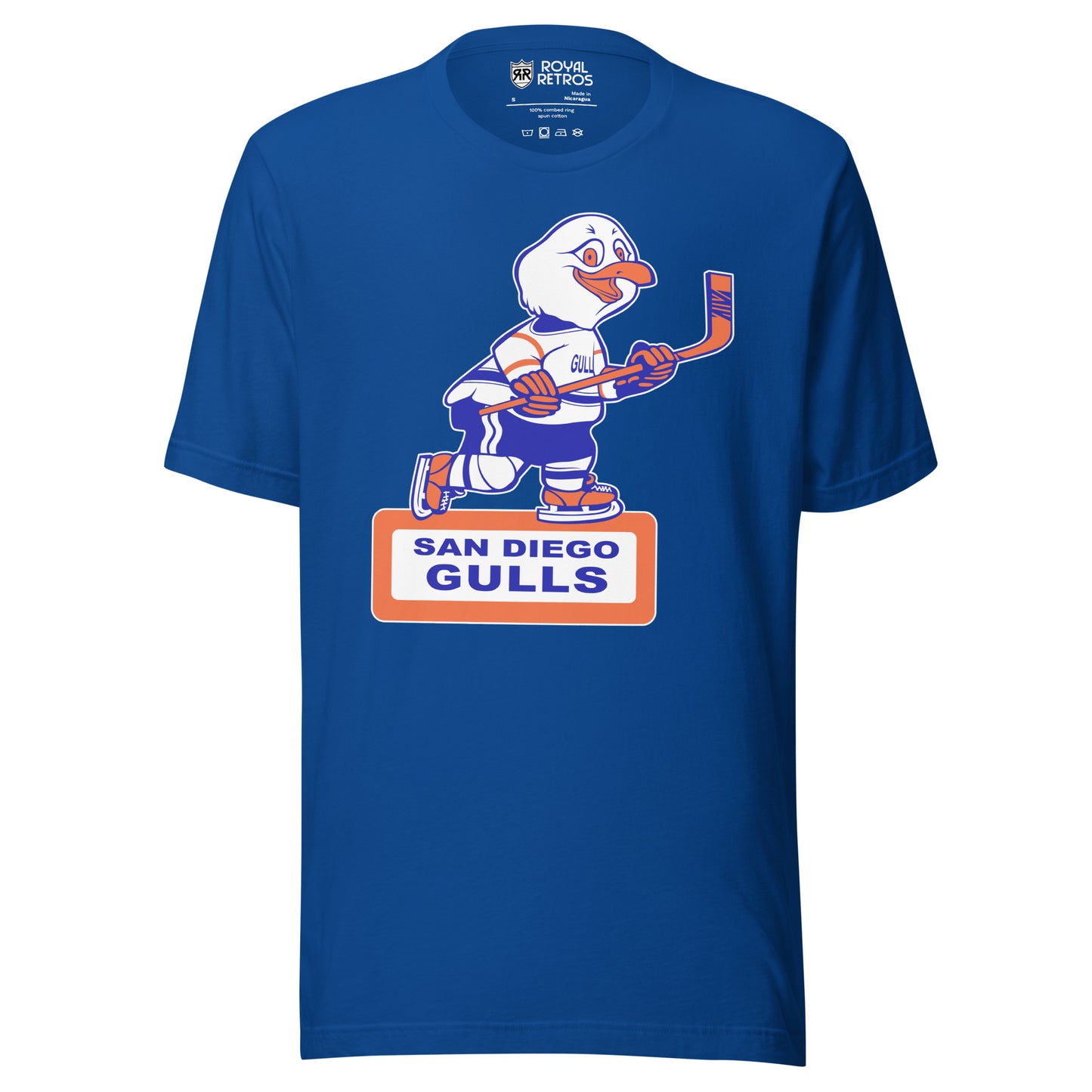 San Diego Gulls T-shirt. Blue. Animated Gull, white with blue and orange trim, skating and holding a hockey stick. Orange box underneath with white background. San Diego in blue above Gulls larger in rectangle. Royal Retros