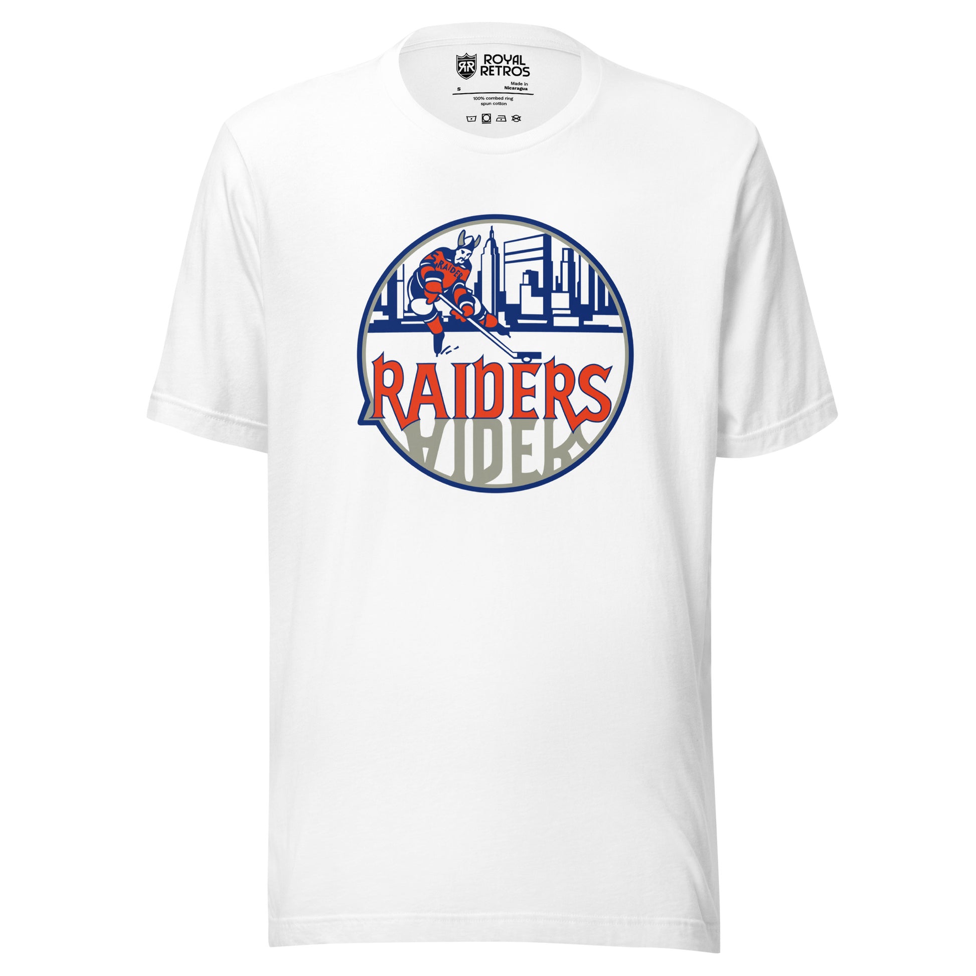 New York Raiders WHA T-shirt. White. Logo on chest. White circle, with hockey player skating in front of Manhattan Skyline in blue. Raiders in orange below skater, reflected in gray below. Royal Retros